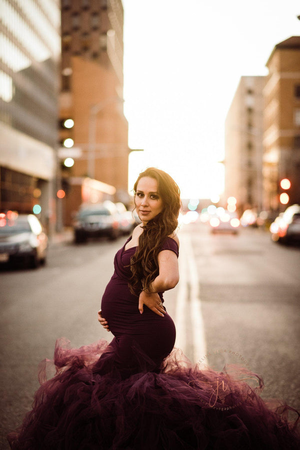 Pregnant mother in the Jacqueline Gown in Plum by Sew Trendy Accessories in the city.