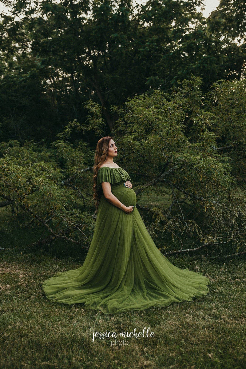 Enchanting pregnant woman wearing the Willow by Sew Trendy layered over the Valentina bodysuit standing in forest.