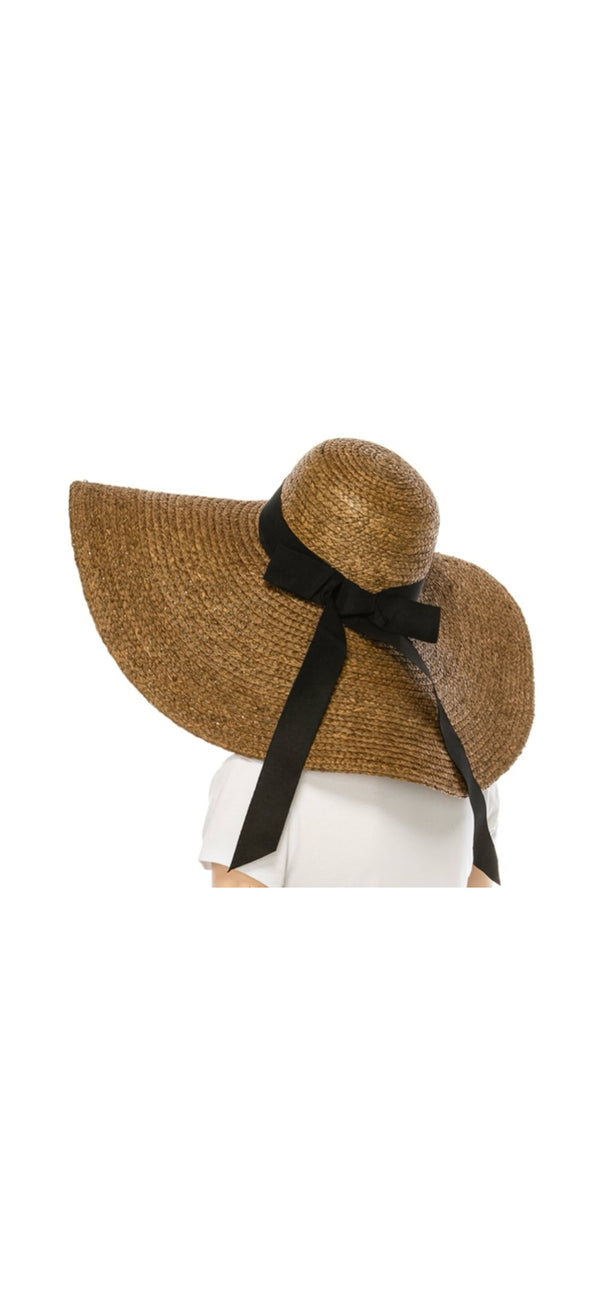 Wide brimmed raffia hat