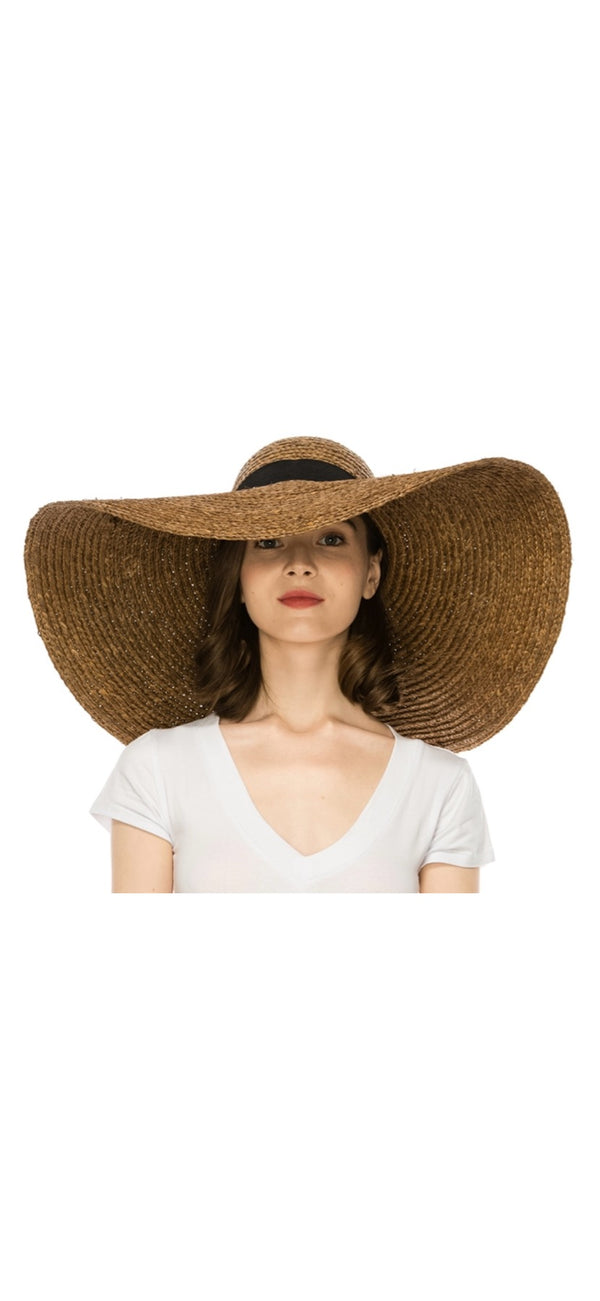 Wide brimmed raffia hat