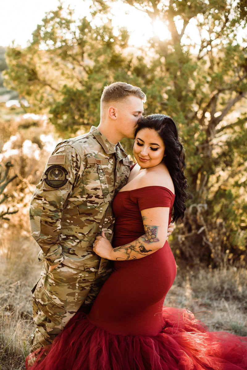 Pregnant mother and military couple in the Jacqueline Gown in brick by Sew Trendy Accessories.