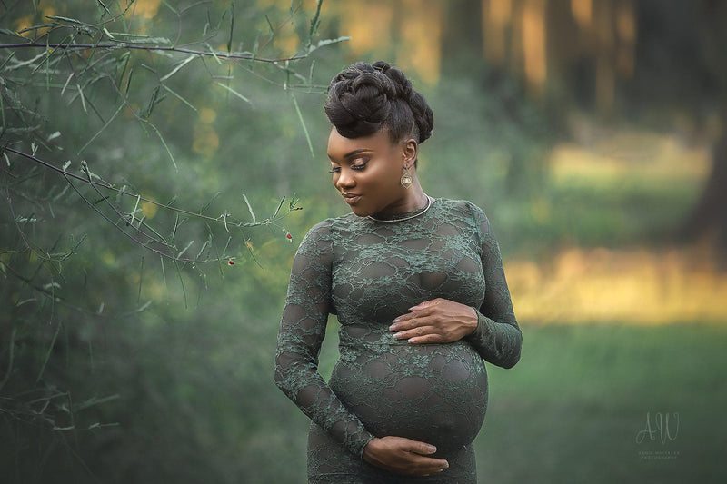 Pregnant woman in the Phoebe Gown in Evergreen by Sew Trendy Accessories