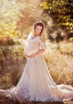 Beautiful pregnant woman wearing the Angelica skirt by Sew Trendy, standing in a field at springtime.